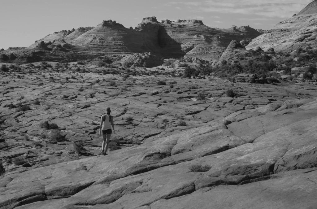 woman walking in canyon land